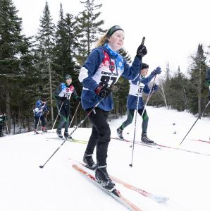 several cross-country skiers in a race