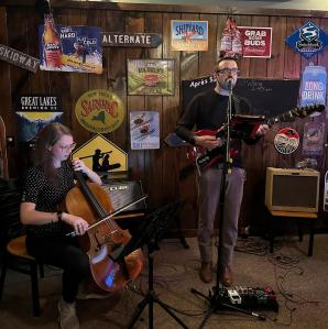 Two stringed musicians performing at Oak Mt