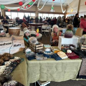 Vendor selling winter hats