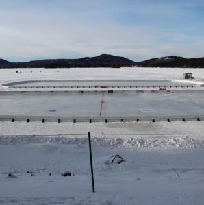 a view of two hockey rinks created on the lake