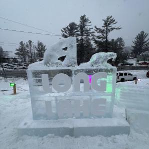 An ice sculture with the words Long Lake