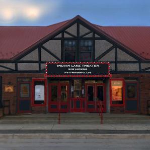 a photo of the movie theater taken outside in front of the building