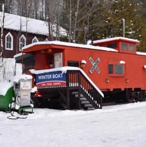 the caboose at Raquette Lake in winter