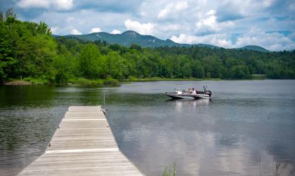 A dock into a scenic lake