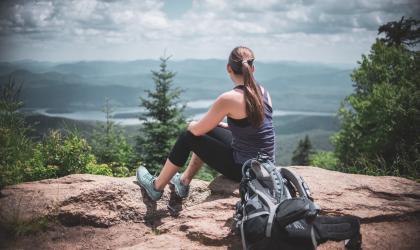 A hiker on the ledge on Snowy Mountain.