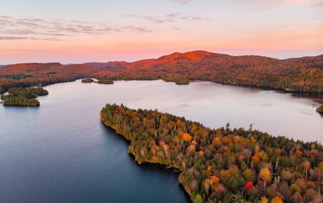 An aerial view of Blue Mountain Lake in the fall.