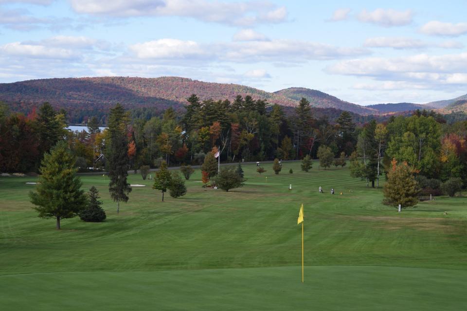 Lake Pleasant golf course at sunset with views of the Adirondack mountains