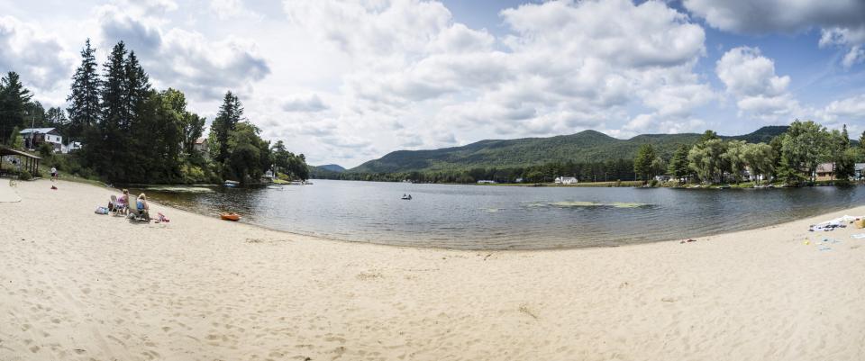 A panoramic view of a lake beach.