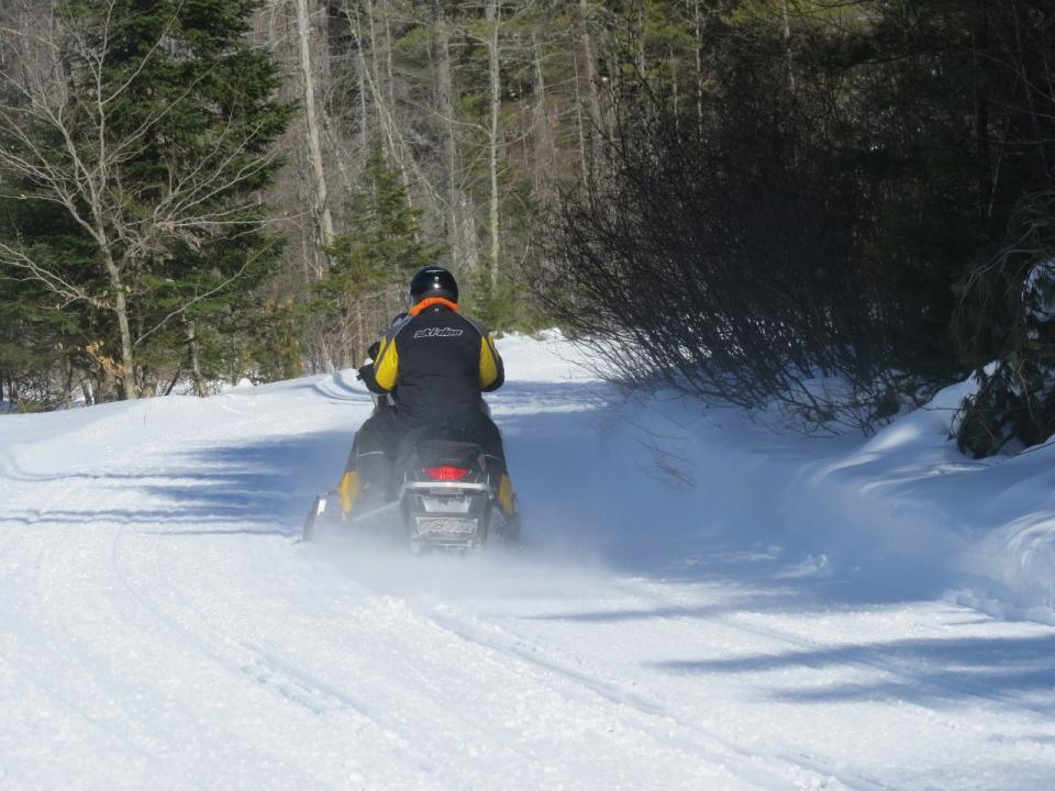 Snowmobile along the trail