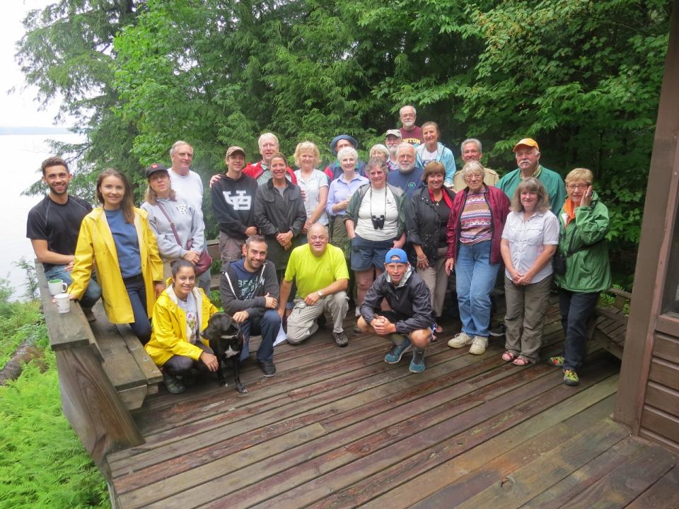 A group of volunteers with binoculars.