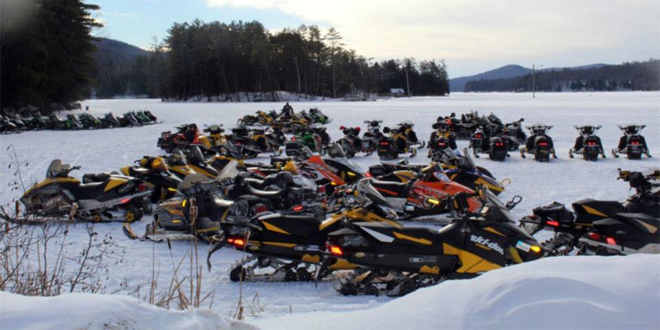 Sleds gather on Jennings Pond in Long Lake