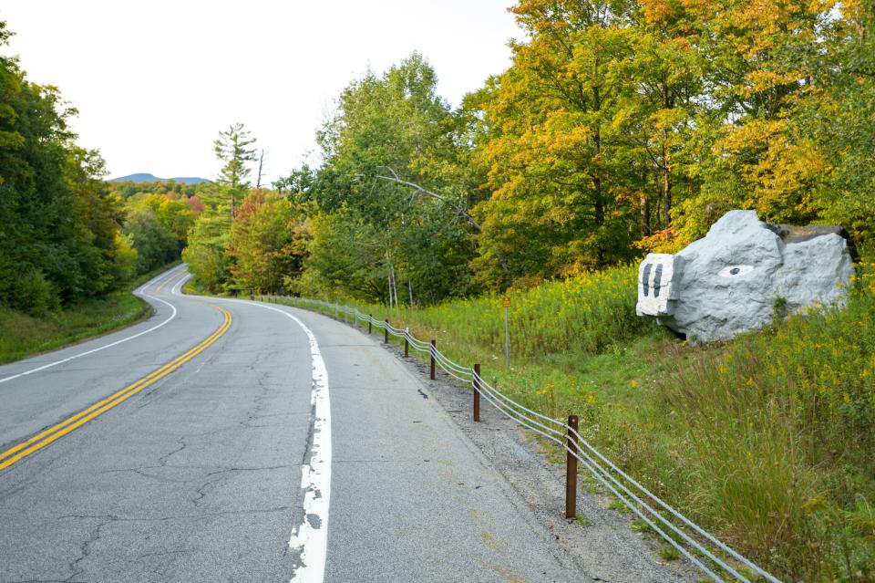 Pig Rock, a giant boulder painted to look like the head of a pig, sits to the side of Route 30 on the approach to Speculator..