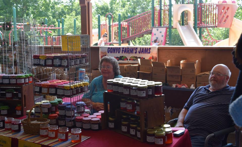 Vendors selling home made preserves in the pavillion