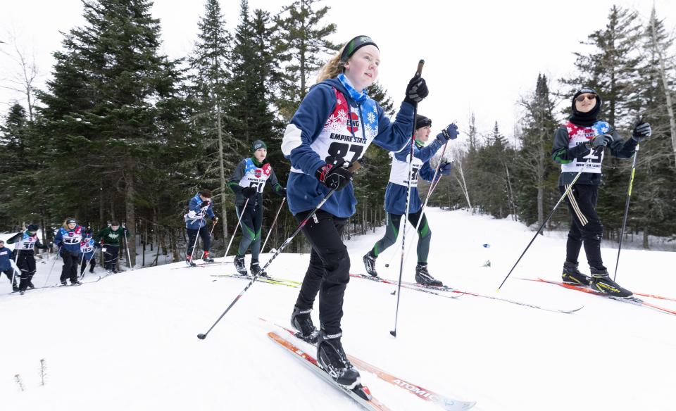 several cross-country skiers in a race