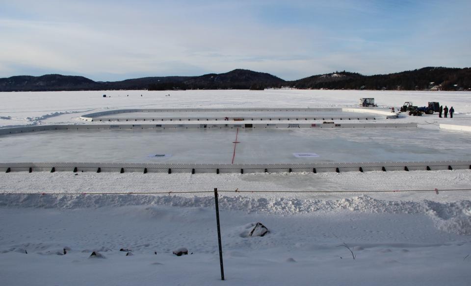 a view of two hockey rinks created on the lake