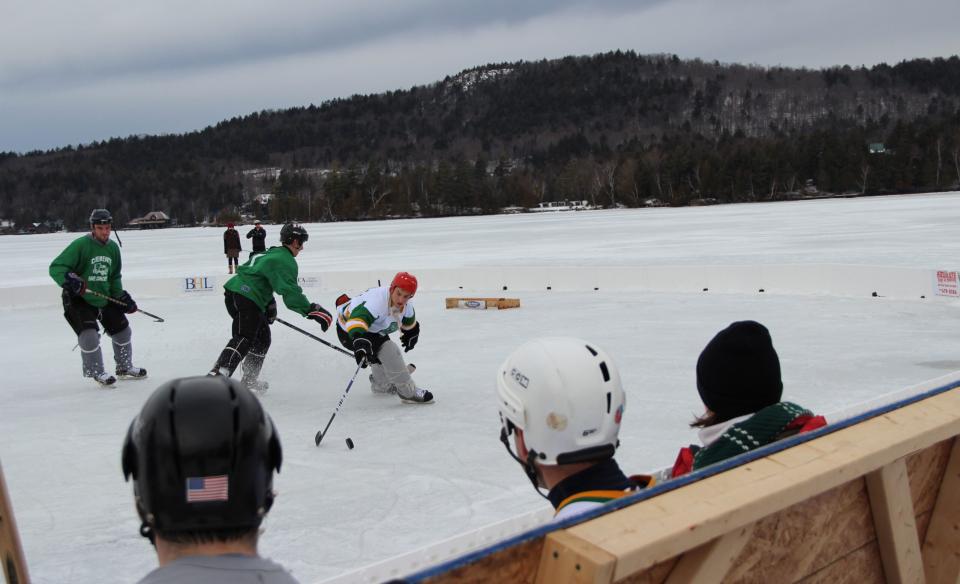 Hockey players on the ice in action