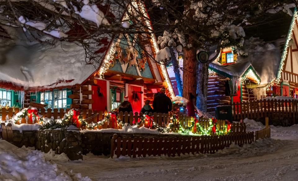 A home decorated with lights for Christmas