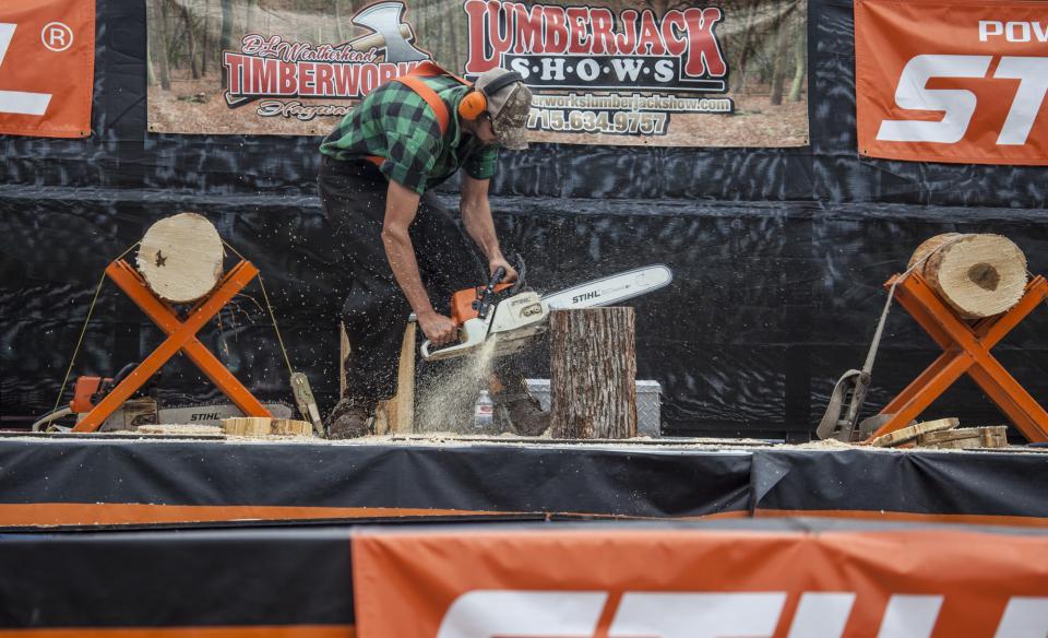 A man in a chainsaw competition