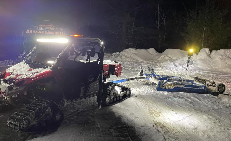 A mini groomer working at night