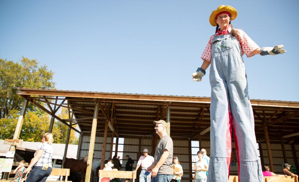 A woman on stilts