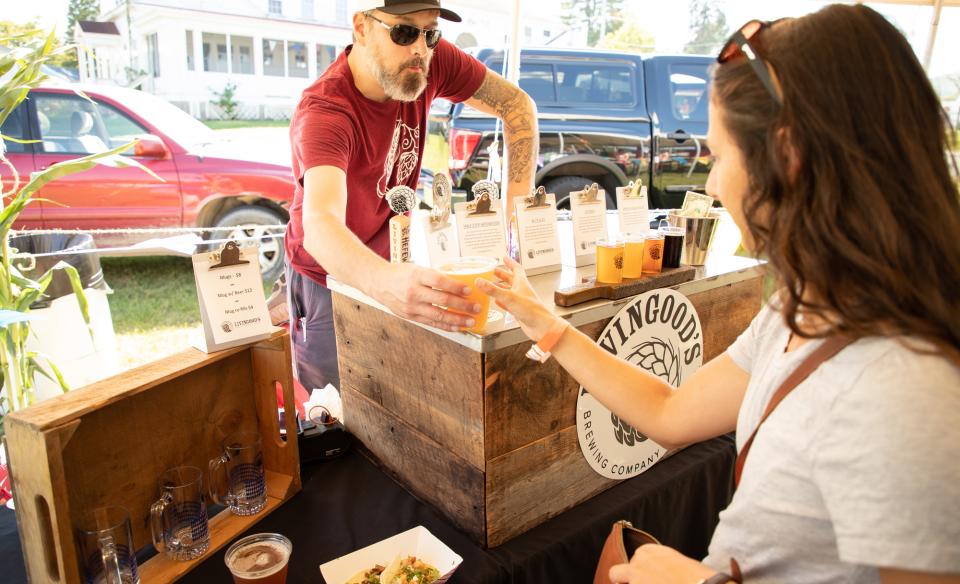 A woman served beer