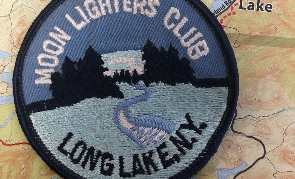 the moonlighters club badge on a snowmobile map