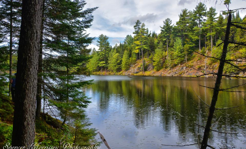 Narrows and cliffs add to the paddling interest of Lost Ponds.