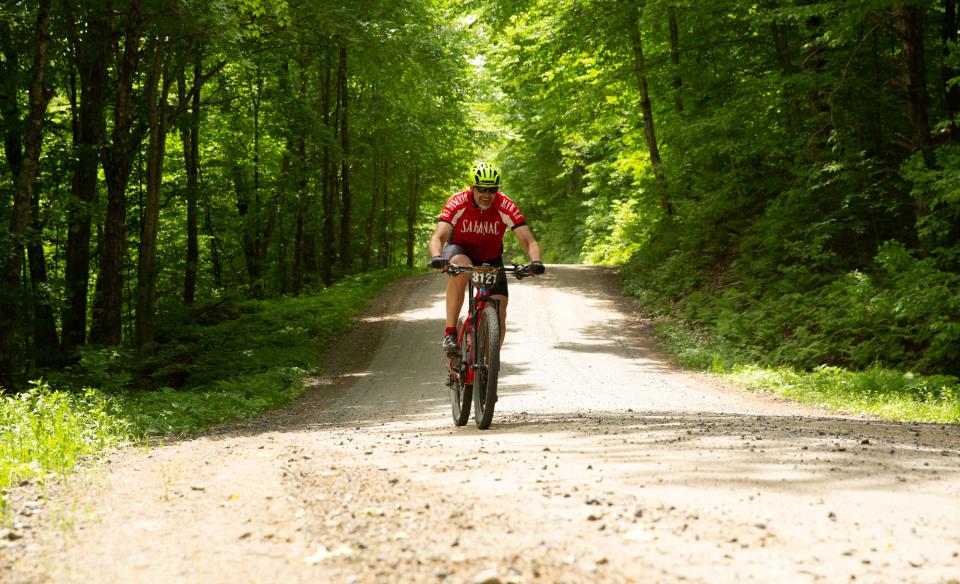 A cyclist on a gravel road