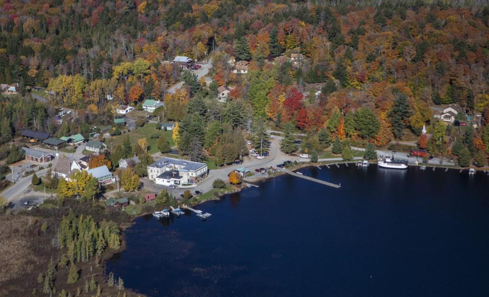 Aerial view of a lakeside town in the fall