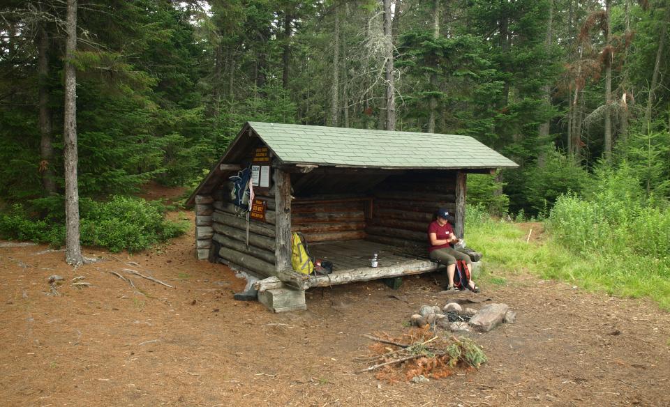 A hiker in a lean to