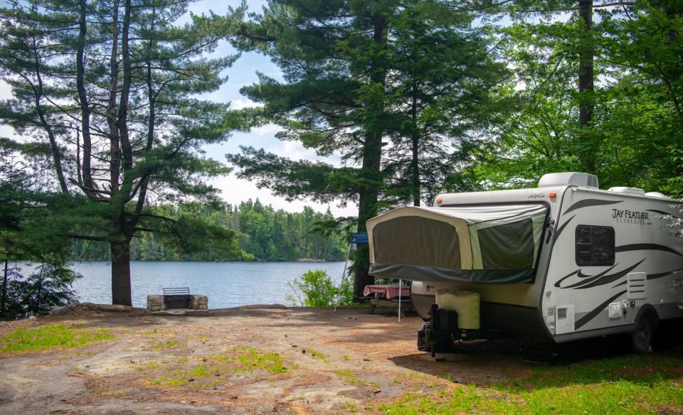 A camper by the water