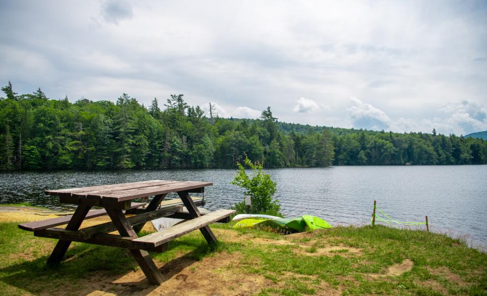 A picnic table by the water