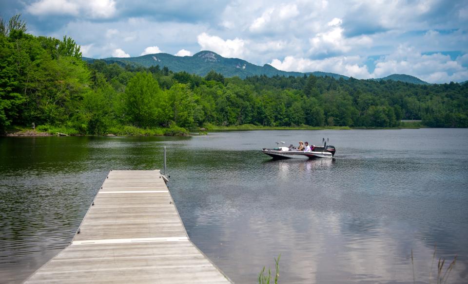 A dock into a scenic lake