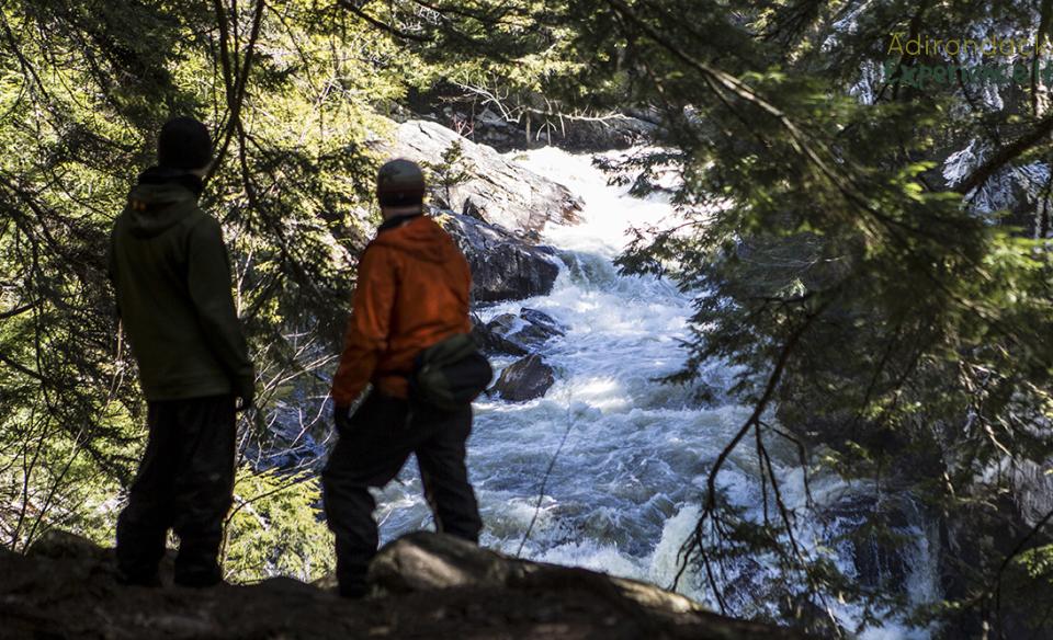 A couple looks out at Auger Flats Falls