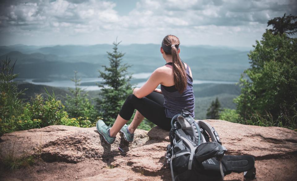 A hiker on the ledge on Snowy Mountain.